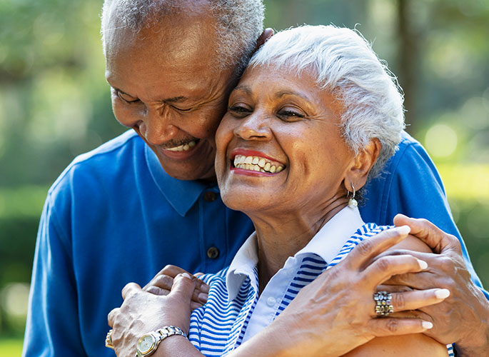 Elderly couple smiling